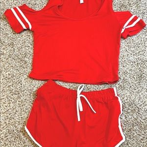 Juniors/ Misses peekaboo should cropped top and short set, size Large.